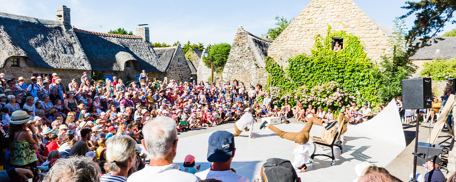 Hip Hop demonstration within the thatched houses hamlet